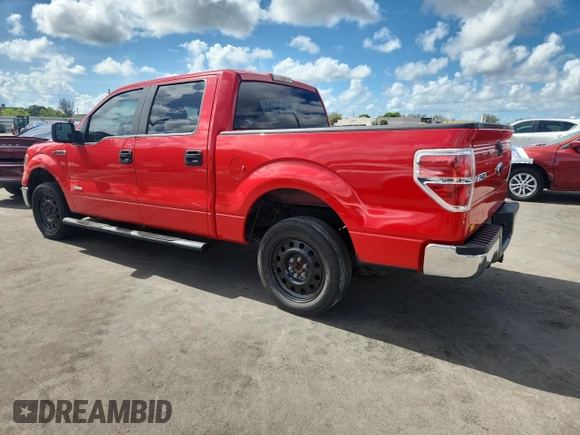 2014 Ford F-150 XL with VIN 1FTFW1CT3EFC74625, listed as a Copart auction lot 62128225 with 223,803 mi miles and Salvage title. Bid and sale history available at DreamBid. Image 2.