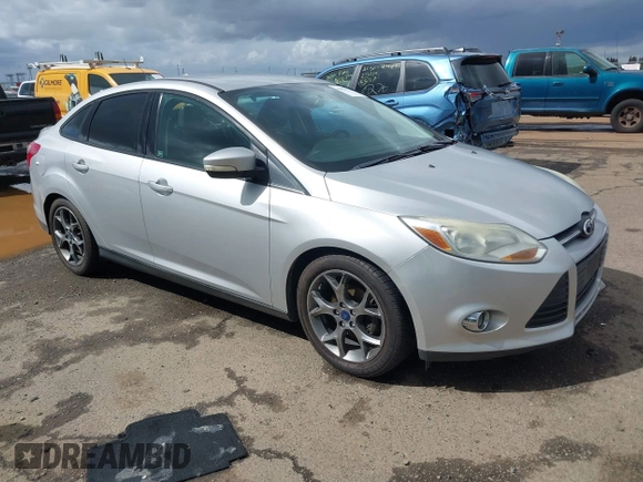 2014 Ford Focus SE with VIN 1FADP3F24EL323728, listed as a IAAI auction lot 41826974 with 141,357 mi miles and . Bid and sale history available at DreamBid. Image 1.
