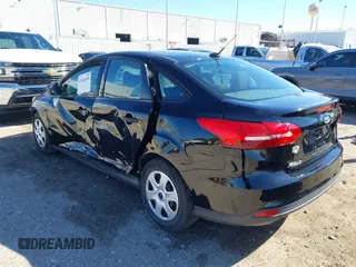 2018 Ford Focus S with VIN 1FADP3E29JL259004, listed as a IAAI auction lot 41841485 with 77,567 mi miles. Bid and sale history available at carsss.com. Image 3.