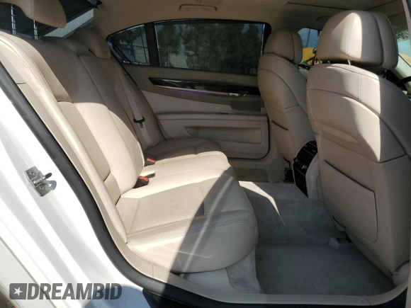 2012 BMW 7 Series 740Li with VIN WBAKB4C55CC575826, listed as a Copart auction lot 74012564 with 140,577 mi miles and Salvage Title. Bid and sale history available at carsss.com. Image 11.
