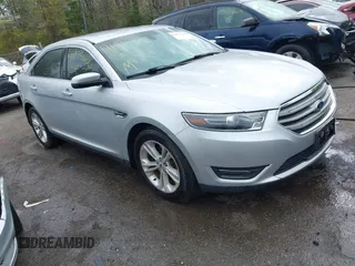 2015 Ford Taurus SEL with VIN 1FAHP2H88FG153946, listed as a IAAI auction lot 41973444 with 153,962 mi miles. Bid and sale history available at carsss.com. Image 1.