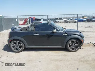 2012 MINI Roadster S with VIN WMWSY3C56CT144520, listed as a IAAI auction lot 41818205 with 86,836 mi miles and . Bid and sale history available at DreamBid. Image 13.