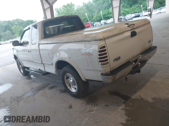 1997 Ford F-150 XL with VIN 1FTDX1861VNA65140, listed as a IAAI auction lot 42086211 with 412,065 mi miles. Bid and sale history available at carsss.com. Image 3.