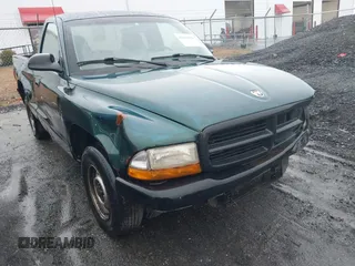 1999 Dodge Dakota SLT with VIN 1B7FL26XXXS209424, listed as a IAAI auction lot 41264544 with 70,523 mi miles. Bid and sale history available at carsss.com. Image 1.