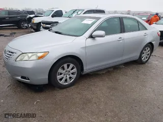 2007 Toyota Camry CE with VIN 4T1BE46K57U075558, listed as a IAAI auction lot 41948885 with 275,636 mi miles. Bid and sale history available at carsss.com. Image 2.