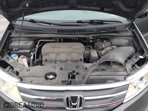 2012 Honda Odyssey EX-L with VIN 5FNRL5H6XCB032366, listed as a IAAI auction lot 41943625 with 73,236 mi miles and . Bid and sale history available at carsss.com. Image 10.