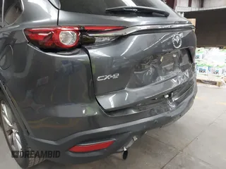 2017 Mazda CX-9 Grand Touring z VIN JM3TCADY2H0134070, wystawiony jako IAAI lot #41611243 z przebiegiem 87 046 mil mil oraz . Historia ofert i sprzedaży dostępna na DreamBid. Obrazek 6.