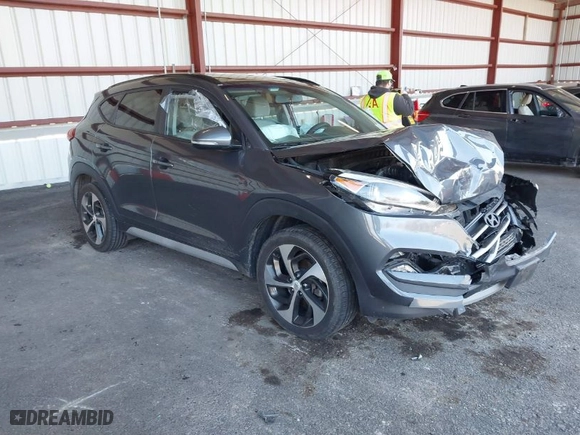 2018 Hyundai Tucson Value with VIN KM8J3CA20JU762120, listed as a IAAI auction lot 41878796 with 103,346 mi miles. Bid and sale history available at carsss.com. Image 1.