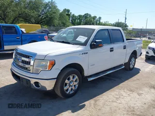 2013 Ford F-150 XL with VIN 1FTFW1CT1DFA78052, listed as a IAAI auction lot 42033387 with 116,264 mi miles. Bid and sale history available at carsss.com. Image 2.