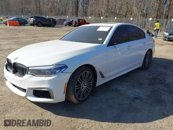 2018 BMW 5 Series M550i xDrive with VIN WBAJB9C53JB036097, listed as a IAAI auction lot 41743031 with 70,164 mi miles and . Bid and sale history available at carsss.com. Image 18.