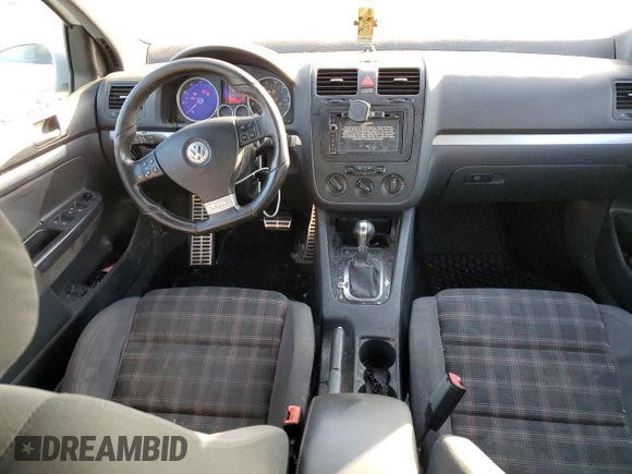 2009 Volkswagen GTI z VIN WVWHD71KX9W061673, wystawiony jako Copart lot #80168754 z przebiegiem 153 396 mil mil oraz Czysty tytuł • Clean title. Historia ofert i sprzedaży dostępna na DreamBid. Obrazek 8.