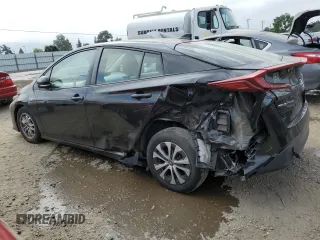 2021 Toyota Prius LE with VIN JTDKAMFP7M3178896, listed as a Copart auction lot 55634965 with 48,576 mi miles and Salvage Title. Bid and sale history available at DreamBid. Image 2.