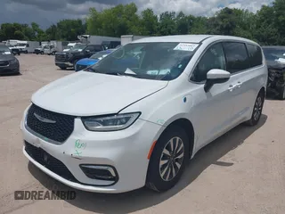 2023 Chrysler Pacifica Hybrid Touring L with VIN 2C4RC1L71PR622474, listed as a IAAI auction lot 42595061 with 55,880 mi miles and . Bid and sale history available at DreamBid. Image 17.