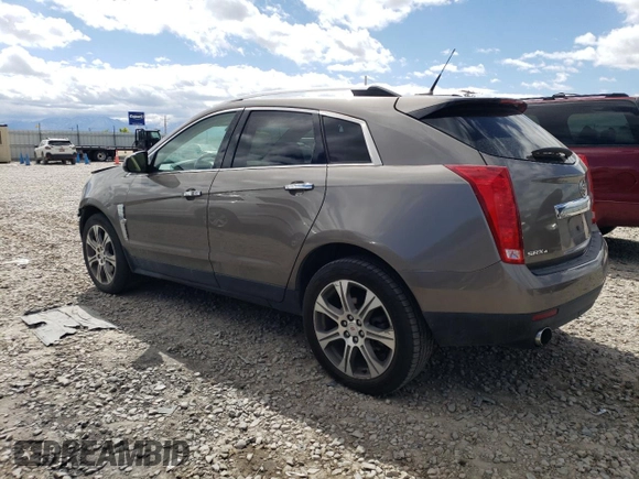 2012 Cadillac SRX Performance Collection with VIN 3GYFNEE34CS589833, listed as a Copart auction lot 56138324 with Not provided miles and Salvage title. Bid and sale history available at DreamBid. Image 2.