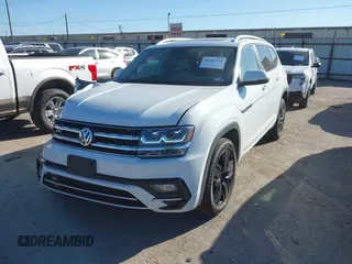 2018 Volkswagen Atlas SEL with VIN 1V2RR2CA1JC566065, listed as a IAAI auction lot 41687434 with 77,795 mi miles and . Bid and sale history available at DreamBid. Image 18.