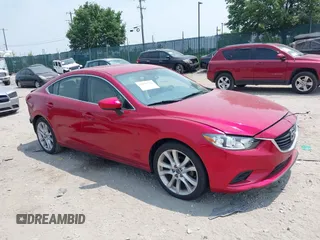 2014 Mazda 6 i Touring with VIN JM1GJ1V6XE1133980, listed as a IAAI auction lot 42438723 with 5,318 mi miles and . Bid and sale history available at DreamBid. Image 1.