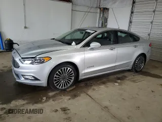 2017 Ford Fusion Hybrid Titanium с VIN 3FA6P0RU4HR223512, выставлен на аукционе Copart как лот 58739435 с пробегом 174 604 миль миль и Чистый • Clean title. История ставок и продаж доступна на DreamBid. Изображение 1.