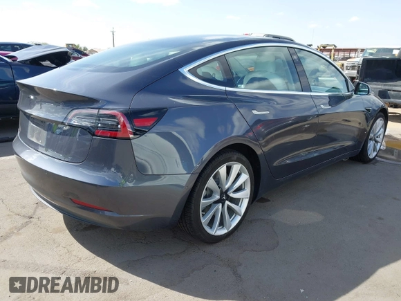 2018 Tesla Model 3 Long Range Battery with VIN 5YJ3E1EA5JF169097, listed as a IAAI auction lot 41916873 with 81,919 mi miles. Bid and sale history available at carsss.com. Image 4.