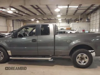 2005 Ford F-150 STX with VIN 1FTRX12W95NB38107, listed as a IAAI auction lot 41185100 with 201,171 mi miles. Bid and sale history available at carsss.com. Image 14.