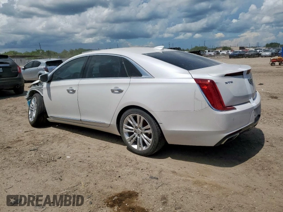 2018 Cadillac XTS Luxury with VIN 2G61M5S31J9124558, listed as a Copart auction lot 62873275 with 142,727 mi miles and Salvage title. Bid and sale history available at DreamBid. Image 2.
