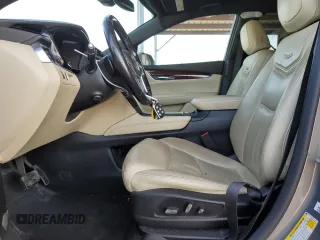 2019 Cadillac XT5 Luxury FWD z VIN 1GYKNCRS4KZ221304, wystawiony jako Copart lot #54995415 z przebiegiem 128 940 mil mil oraz Szkoda całkowita • Salvage title. Historia ofert i sprzedaży dostępna na DreamBid. Obrazek 7.