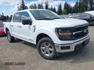 2024 Ford F-150 XLT with VIN 1FTFW3LD4RFA19847, listed as a IAAI auction lot 42082936 with 26,857 mi miles. Bid and sale history available at carsss.com. Image 1.