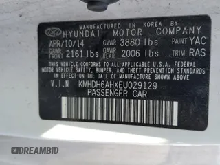 2014 Hyundai Elantra Coupe with VIN KMHDH6AHXEU029129, listed as a Copart auction lot 79674194 with 124,274 mi miles and Salvage Title. Bid and sale history available at carsss.com. Image 12.
