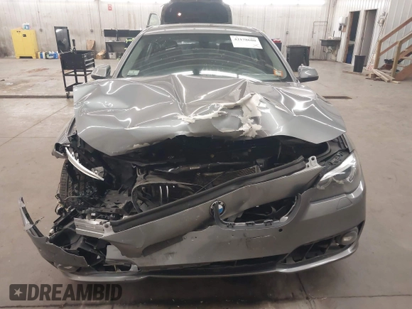 2015 BMW 5 Series 528i xDrive with VIN WBA5A7C55FD623888, listed as a IAAI auction lot 42178680 with 96,267 mi miles and . Bid and sale history available at DreamBid. Image 13.