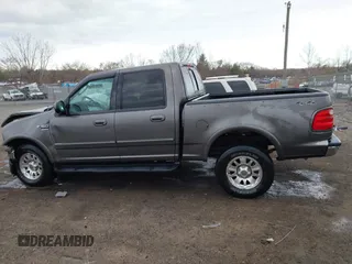 2003 Ford F-150 XLT with VIN 1FTRW086X3KA54557, listed as a IAAI auction lot 41888037 with 217,512 mi miles. Bid and sale history available at carsss.com. Image 14.