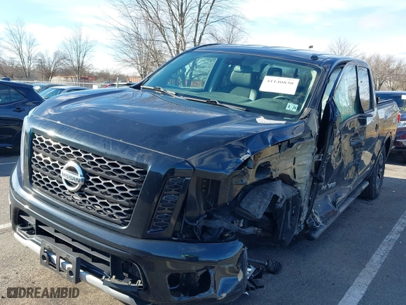 2019 Nissan Titan SV with VIN 1N6AA1E55KN517471, listed as a IAAI auction lot 41140830 with NaN miles. Bid and sale history available at carsss.com. Image 17.