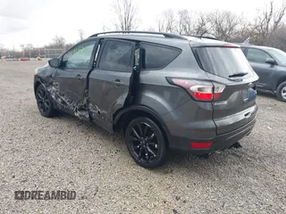 2017 Ford Escape SE with VIN 1FMCU0G97HUE53859, listed as a IAAI auction lot 41898162 with 79,619 mi miles. Bid and sale history available at carsss.com. Image 3.