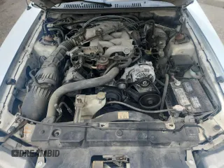 2000 Ford Mustang with VIN 1FAFP404XYF130074, listed as a Copart auction lot 60874945 with 233,035 mi miles and Non repairable. Bid and sale history available at DreamBid. Image 11.