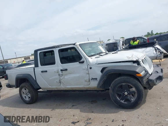 2020 Jeep Gladiator Sport S with VIN 1C6HJTAG9LL161535, listed as a IAAI auction lot 42053904 with 104,260 mi miles and . Bid and sale history available at DreamBid. Image 13.