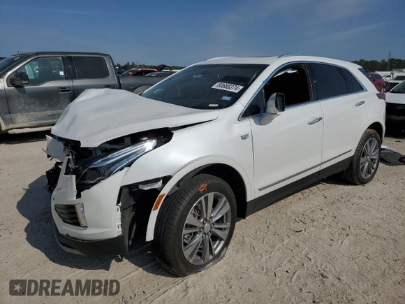 2024 Cadillac XT5 FWD Premium Luxury with VIN 1GYKNCRS1RZ735184, listed as a Copart auction lot 80688374 with 10,587 mi miles and Salvage Title. Bid and sale history available at carsss.com. Image 1.