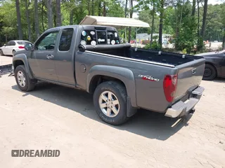 2012 GMC Canyon SLE2 z VIN 1GTJ6PFE2C8128602, wystawiony jako IAAI lot #42421110 z przebiegiem 79 273 mil mil oraz . Historia ofert i sprzedaży dostępna na DreamBid. Obrazek 3.