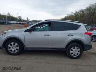 2015 Toyota RAV4 LE with VIN 2T3BFREV0FW407207, listed as a IAAI auction lot 42013048 with 212,301 mi miles. Bid and sale history available at carsss.com. Image 14.