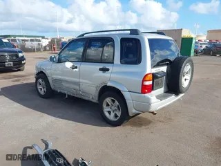 2003 Suzuki Grand Vitara with VIN JS3TE62VX34101622, listed as a IAAI auction lot 41689760 with 152,104 mi miles. Bid and sale history available at carsss.com. Image 3.