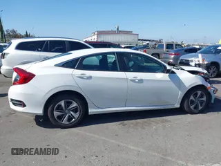 2020 Honda Civic LX z VIN 19XFC2F67LE212561, wystawiony jako IAAI lot #42272481 z przebiegiem 50 681 mil mil oraz . Historia ofert i sprzedaży dostępna na DreamBid. Obrazek 14.
