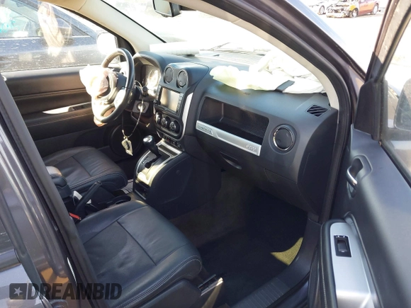 2017 Jeep Compass Latitude with VIN 1C4NJDEB0HD190200, listed as a IAAI auction lot 41733462 with 77,374 mi miles and . Bid and sale history available at DreamBid. Image 5.