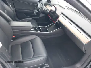 2018 Tesla Model 3 Long Range Battery with VIN 5YJ3E1EA2JF071855, listed as a IAAI auction lot 41314974 with 169,318 mi miles and . Bid and sale history available at DreamBid. Image 5.