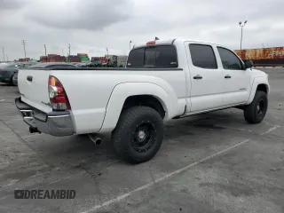 2014 Toyota Tacoma PreRunner with VIN 3TMKU4HN9EM040957, listed as a Copart auction lot 76579404 with 91,222 mi miles and Salvage title. Bid and sale history available at DreamBid. Image 3.