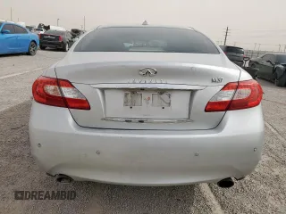 2013 Infiniti M с VIN JN1BY1AP2DM512105, выставлен на аукционе Copart как лот 57183655 с пробегом 159 180 миль миль и Списание • Salvage title. История ставок и продаж доступна на DreamBid. Изображение 6.