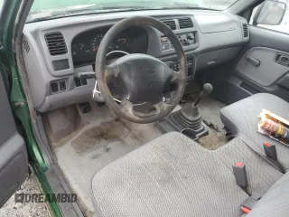 1998 Nissan Frontier XE with VIN 1N6DD21S4WC345165, listed as a Copart auction lot 87465104 with Not provided miles and Clean title. Bid and sale history available at DreamBid. Image 8.