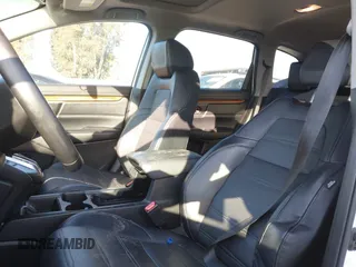 2017 Honda CR-V Touring with VIN 2HKRW1H96HH517669, listed as a IAAI auction lot 41653040 with 97,961 mi miles. Bid and sale history available at carsss.com. Image 21.