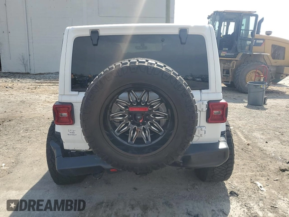 2021 Jeep Wrangler Unlimited Sahara с VIN 1C4HJXEN7MW823881, выставлен на аукционе Copart как лот 53062425 с пробегом 28 597 миль миль и Списание • Salvage title. История ставок и продаж доступна на DreamBid. Изображение 6.