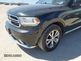 2016 Dodge Durango Limited with VIN 1C4RDHDG9GC360118, listed as a IAAI auction lot 41696388 with 217,550 mi miles. Bid and sale history available at carsss.com. Image 6.