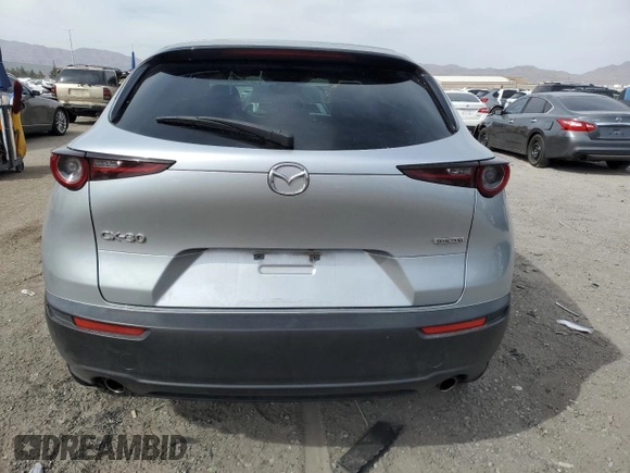 2021 Mazda CX-30 Select with VIN 3MVDMABLXMM256327, listed as a Copart auction lot 51185235 with 76,630 mi miles and Salvage Title. Bid and sale history available at DreamBid. Image 6.