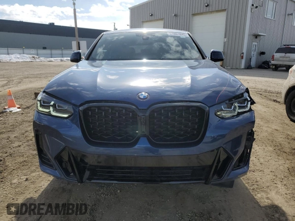 2025 BMW X4 xDrive30i with VIN 5UX33DT05S9Y19798, listed as a Copart auction lot 51861845 with 718 mi miles and Salvage Title. Bid and sale history available at carsss.com. Image 5.