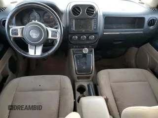 2014 Jeep Patriot Latitude with VIN 1C4NJPFBXED771229, listed as a Copart auction lot 84283034 with 136,340 mi miles and Non Repairable. Bid and sale history available at carsss.com. Image 8.