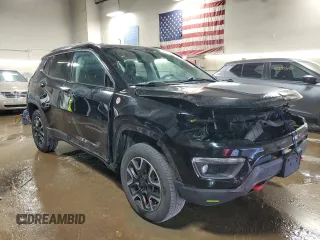 2019 Jeep Compass Trailhawk with VIN 3C4NJDDB1KT660608, listed as a Copart auction lot 51926615 with 81,047 mi miles and Salvage Title. Bid and sale history available at DreamBid. Image 4.